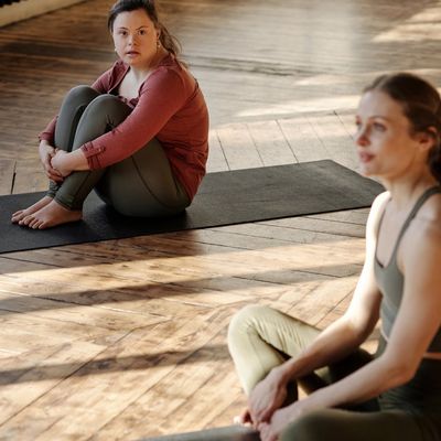 A calm, empty room with natural light, ready for a workout session.